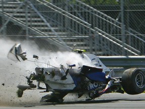 BMW Sauber driver Robert Kubica of Poland crashes hard at the hairpin turn during the Canadian Grand Prix on June 10, 2007 in Montreal.