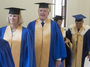 Former Prime Minister Brian Mulroney waits for the start of the graduation ceremony where he will receive an honorary degree from the Université de Montréal on Friday, June 3, 2016 in Montreal.