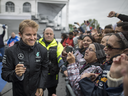 Mercedes F1 driver Nico Rosberg signs autographs for racing fans during the open house for the Formula One Canadian Grand Prix at the Circuit Gilles-Villeneuve in Montreal on Thursday, June 9, 2016.