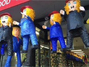 Donald Trump pinatas hang outside of Discount City, a general store in a Latino neighbourhood of San Francisco where they're the top-selling pinata, on Sunday, May 29, 2016.