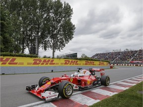 Ferrari Formula One driver Sebastian Vettel exits turn two during the Formula One Canadian Grand Prix at Circuit Gilles-Villeneuve in Montreal on Sunday, June 12, 2016. (Dario Ayala / Montreal Gazette)