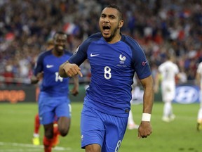 France's Dimitri Payet celebrates after scoring his side's second goal during the Euro 2016 Group A soccer match between France and Albania at the Velodrome stadium in Marseille, France, Wednesday, June 15, 2016.