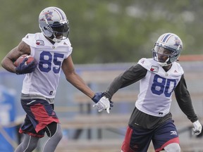 Alouettes receivers B. J. Cunningham (left) and Chandler Jones during  training camp at Bishop's University in Lennoxville on May 29, 2016.