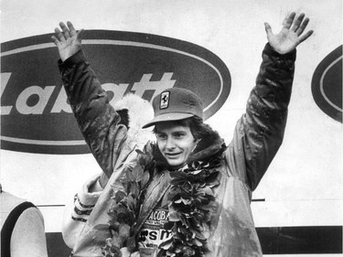 Local hero Gilles Villeneuve waves from the podium on Île Notre Dame following his 1978 Canadian Grand Prix win.