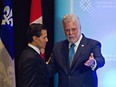 Mexico President Enrique Pena Nieto meets with Quebec Premier Philippe Couillard in Quebec City, Monday, June 27, 2016.