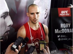 Rory MacDonald, No. 1 ranked UFC welterweight contender, speaks to reporters following an open workout at the Aberdeen Pavilion on Thursday, June 16, 2016 in Ottawa.