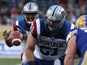 Alouettes QB Kevin Glenn takes a snap during CFL action against the Winnipeg Blue Bombers in Winnipeg on Wed., June 8, 2016.