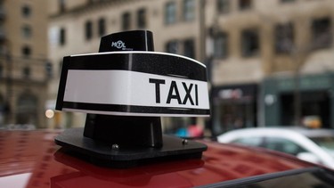 The logo of a taxi parked on de Maisonneuve Blvd. near the corner of Stanley St. in Montreal on Monday, April 18, 2016. .jpg