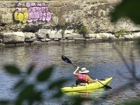 A kayaker enjoys the breeze on the Lachine Canal in Montreal during a 2015 heat wave.