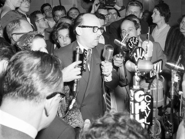 Jean Drapeau's first election as mayor of Montreal on Oct. 25, 1954 in front of radio mics. The Radio-Canada journalist seen at the right of the mayor is future premier René Lévesque.