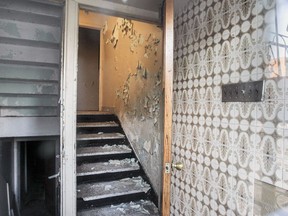 Peeling paint and plaster in the vestibule of an apartment building at 8151 Stuart Ave. in Montreal on Friday, Feb. 5, 2016.  Owner Claudio Di Giambattista, who died on Dec. 2, 2015, was ordered to pay a former tenant $13,000 in a judgment handed down several days later by Quebec's Rental Board, which found the apartment unliveable and a danger to health.