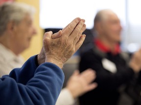 Seniors take part in a chair zumba class at the Alzheimer Groupe centre in Montreal in 2016.