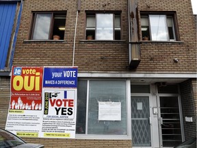 Referendum signs posted on the wall of 406 Legendre St. in Montreal on Wednesday June 1, 2016.