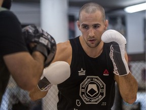No.1-ranked welterweight, Canadian Rory MacDonald (18-3) with trainer Firas Zahabi at Tristar Gym in Montreal, on Wednesday, June 1, 2016. The gym, known world wide, attacks fighters from all over as a place to train.