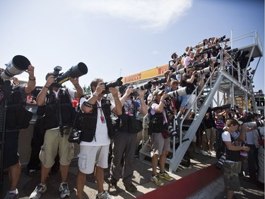 Photographers line up to shoot the finishing ceremony at the end of the 2012 Formula One Canadian Grand Prix. By 2015, close to 400 media members from 21 countries were accredited to cover the event.