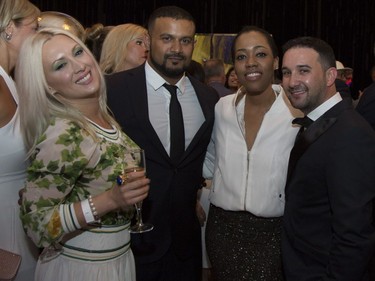 Dax DaSilva, Bradley Grill with friends at a Grand Prix party at the Ritz Carlton in Montreal, Friday June 10, 2016.