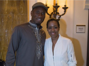 Didier Drogba and Martine St-Victor at a Grand Prix party at the Ritz Carlton in Montreal, Friday, June 10, 2016.