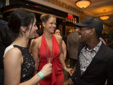 Ima 9 cenew) and friends at a Grand Prix party at the Ritz Carlton in Montreal, Friday, June 10, 2016.