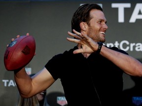 NFL quarterback Tom Brady of the New England Patriots takes part in a Tag Heuer promotional event as part of Grand Prix weekend in Montreal on Saturday June 11, 2016. (Allen McInnis / MONTREAL GAZETTE)