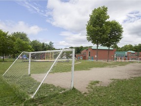 The soccer pitch with missing grass at École de la Samare in Notre-Dame-de-l'Île-Perrot. The school will be getting a new synthetic field.