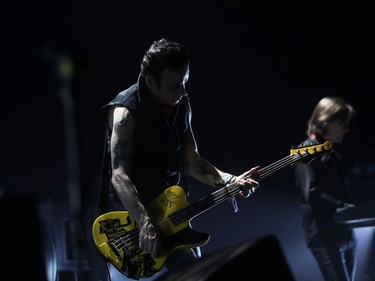 Bass guitarist Simon Gallup of The Cure in performance at the Bell Centre on June 14, 2016.