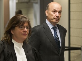 In June 2016, former Montreal executive-committee chairman Frank Zampino, right, leaves a Montreal courtroom with his lawyer, Isabel Schurman, after failing to have proceedings against him stayed.