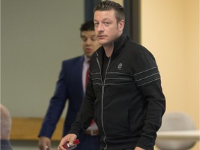 Jonathan Mignacca awaits his sentencing at the Laval courthouse in 2015.