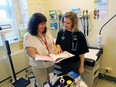 Dr. Joanie Chahine, right, at the Youth Clinic of St. Mary's Family Medicine Centre, with clinic co-ordinator Gettina Zambito.