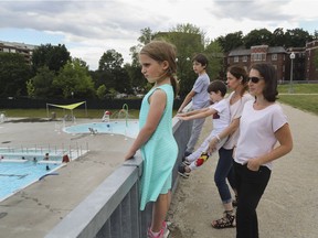 Angela Lehrer with her daughter Arielle, and Myrla Azuelos with her sons Natan (furthest from camera) and Aramis at the Westmount pool.