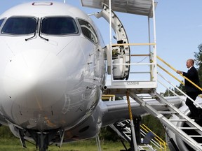 Alain Bellemare, CEO of Bombardier, boards a CS 100 series jet as Bombardier delivers the new plane to Swiss Air in Montreal on Wednesday June 29, 2016.
