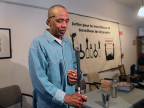 Vecqueth Stephenson, a blind black man stands in the office of CRARR (Centre for research-action on race relations) after a press conference on June 29, 2016. CRARR has taken on the case of this man who was arrested in Mandela Park in Côte-des-Neiges last month.