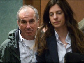 Ronald Weinberg, left, with his lawyer Annie Émond, walk out of courtroom on Monday May 12, 2014.