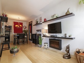 A view of the living room and dining area at the 475 square-feet home of Steve Langille and Katharine Berrigan in Little Italy.