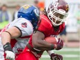 "I'm a physical back who likes to punish," says rookie Alouettes rusher Wayne Moore, right, competing in the CIS East-West Bowl at Molson stadium in 2015.