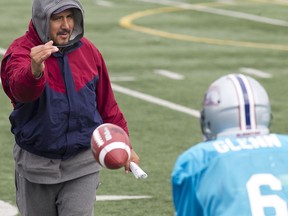October 2015: Montreal Alouettes quarterback Kevin Glenn, right, with Anthony Calvillo during Als practice.