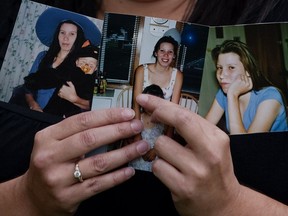 Melanie Morrison of Kahnawake holds pictures of her sister Tiffany, whose body was found May 31, 2010.
