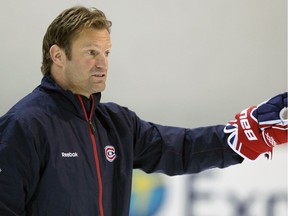 Canadiens assistant coach Kirk Muller addresses players at the Habs' development camp at their Brossard training facility south of  Montreal in 2011.
