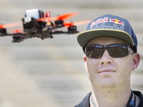 Ryan Walker pilots a drone during the Montreal expo, Saturday, June 25, 2016.