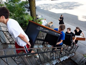 MONTREAL, QUE.: JULY 1, 2011-- (Left to right) Haruki Nakagawa and roommate  Sam hunter carry furniture to their new apartment in Mile End with the help of friends Steve Chamberlain and Kate Mcleod on moving day in Montreal on Friday, July 1, 2011. (Dario Ayala/THE GAZETTE)