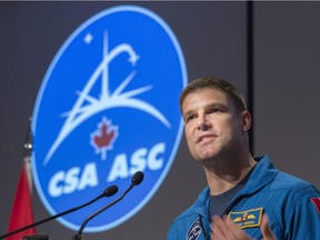 Canadian astronaut Jeremy Hansen addresses employees during an announcement at the Canadian Space Agency, in St-Hubert, Que., on Thursday, Jan. 7, 2016.