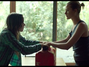 Nell (Ellen Page) and Eva (Evan Rachel Wood) must fend for themselves in Into The Forest: "I loved that it was being told through the relationship between these two sisters," says Page. who also co-produced the film.