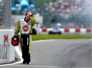 Jacques Villeneuve walks back to the pit after crashing his car into the "Wall of Champions" during the qualifying of the 2002 Montreal Grand Prix. The concrete barrier at the final turn before the stretch to the finish line earned its nickname in mock honour of those who’ve crashed into it. Other victims of the wall include Michael Schumacher, Sebastian Vettel and Nico Rosberg.