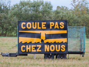 A sign  — Don’t spill in our home —  protests against the Energy East pipeline.