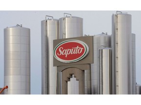 A sign at a Montreal Saputo plant is shown on Jan.13, 2014.