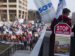 SCFP, known in English as CUPE, union workers demonstrate against the fiscal pact with  Quebec municipalities, near the legislature in Quebec City, Thursday, May 12, 2016.