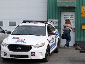 Police raided Remorquage À Vos Frais in the St-Leonard borough of Montreal Wednesday June 8, 2016.
