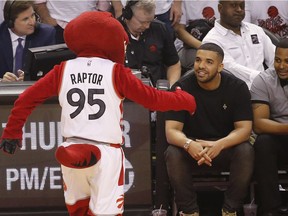 Drake made a friend at a Toronto Raptors game in May.