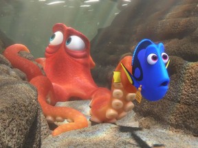 This image released by Disney shows the characters Hank, voiced by Ed O'Neill, left, and Dory, voiced by Ellen DeGeneres, in a scene from "Finding Dory." (Pixar/Disney via AP) ORG XMIT: NYET778