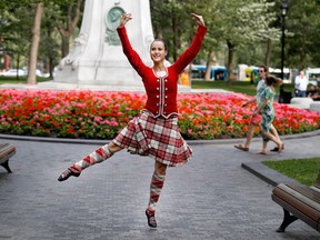 Elise Quinn performs a tradition Scottish dance in Dorchester Square in Montreal on Wednesday July 27, 2016.