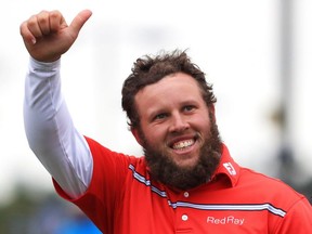 Andrew Johnston of England acknowledges the crowd after his round on 18th green during the third round on day three of the 145th Open Championship at Royal Troon on July 16, 2016, in Troon, Scotland.